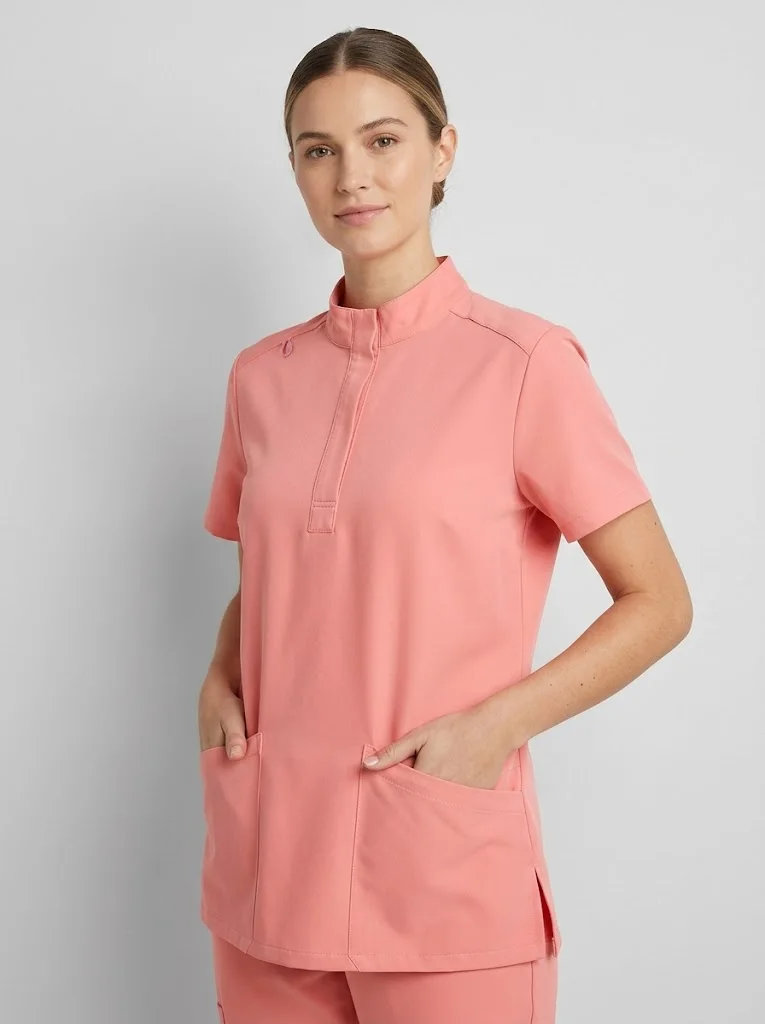 Karisma Threads stand-collar zip scrub top, worn, waist up