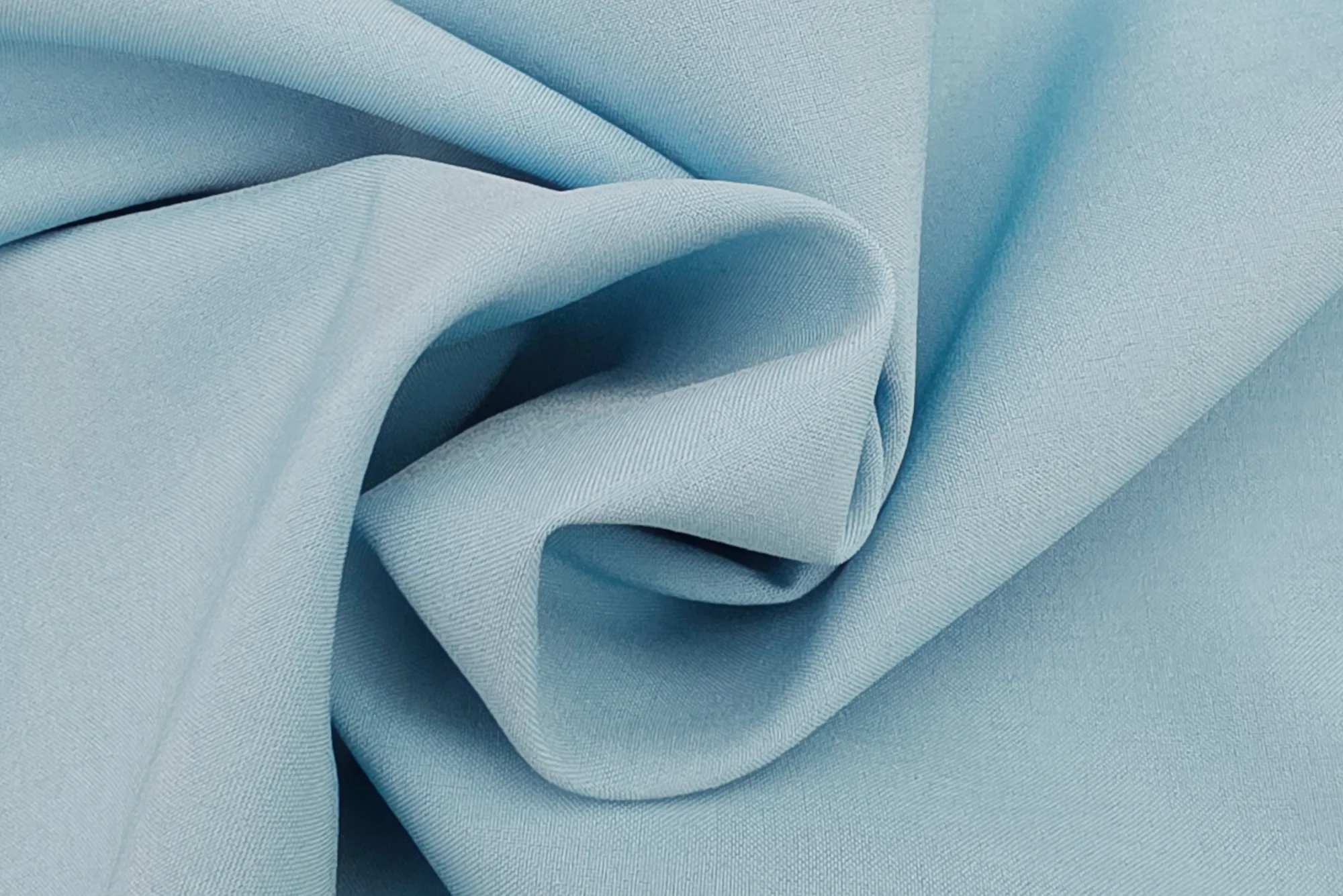 Heavy duty 4-way stretch fabric in light blue, close up